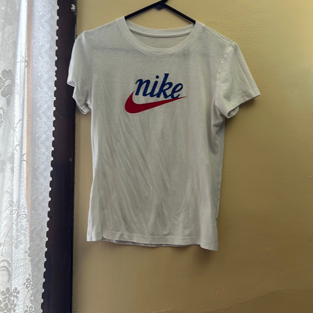 I am selling a white Nike dry fit shirt.